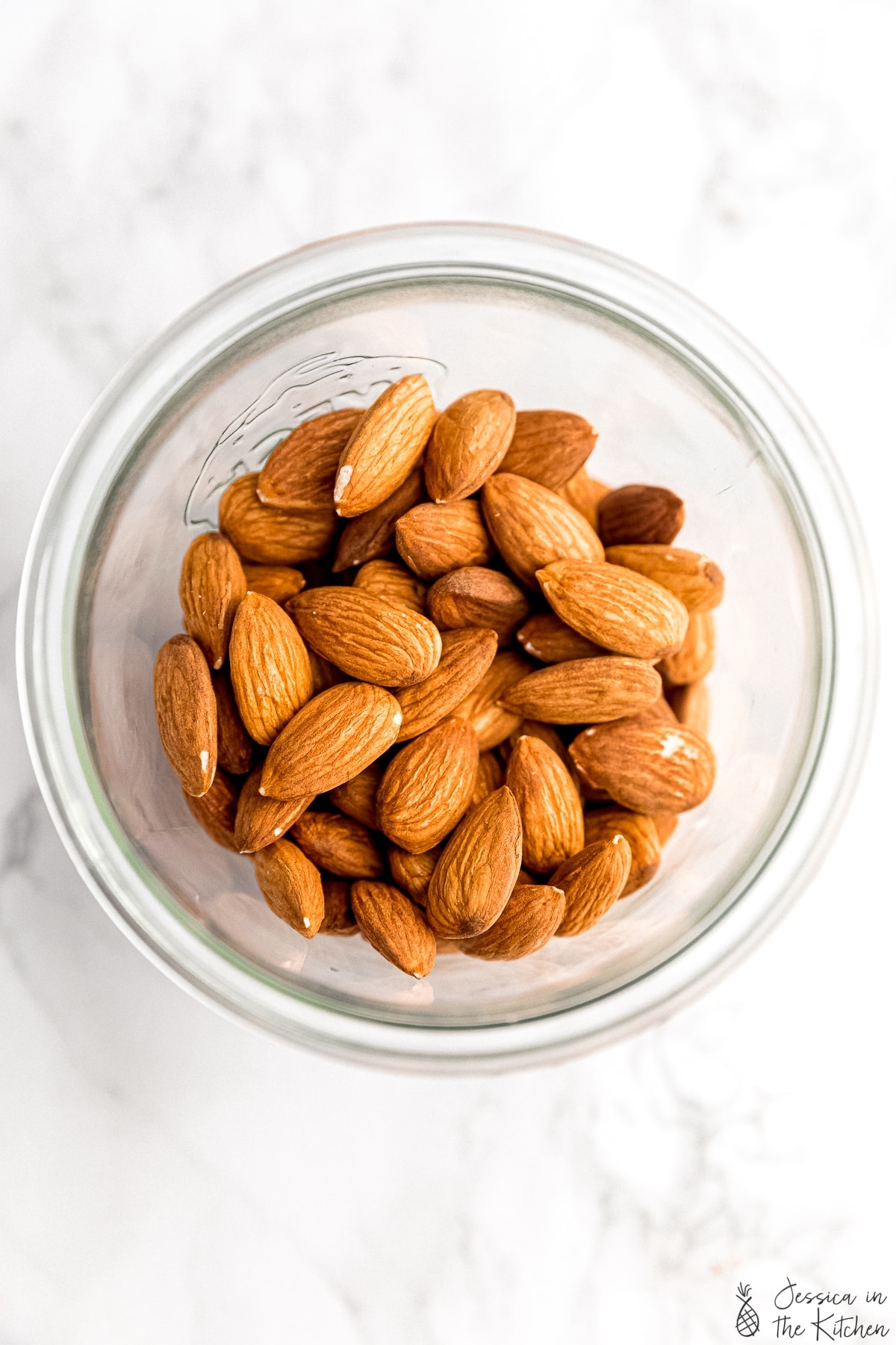 Overhead view of almonds in jar