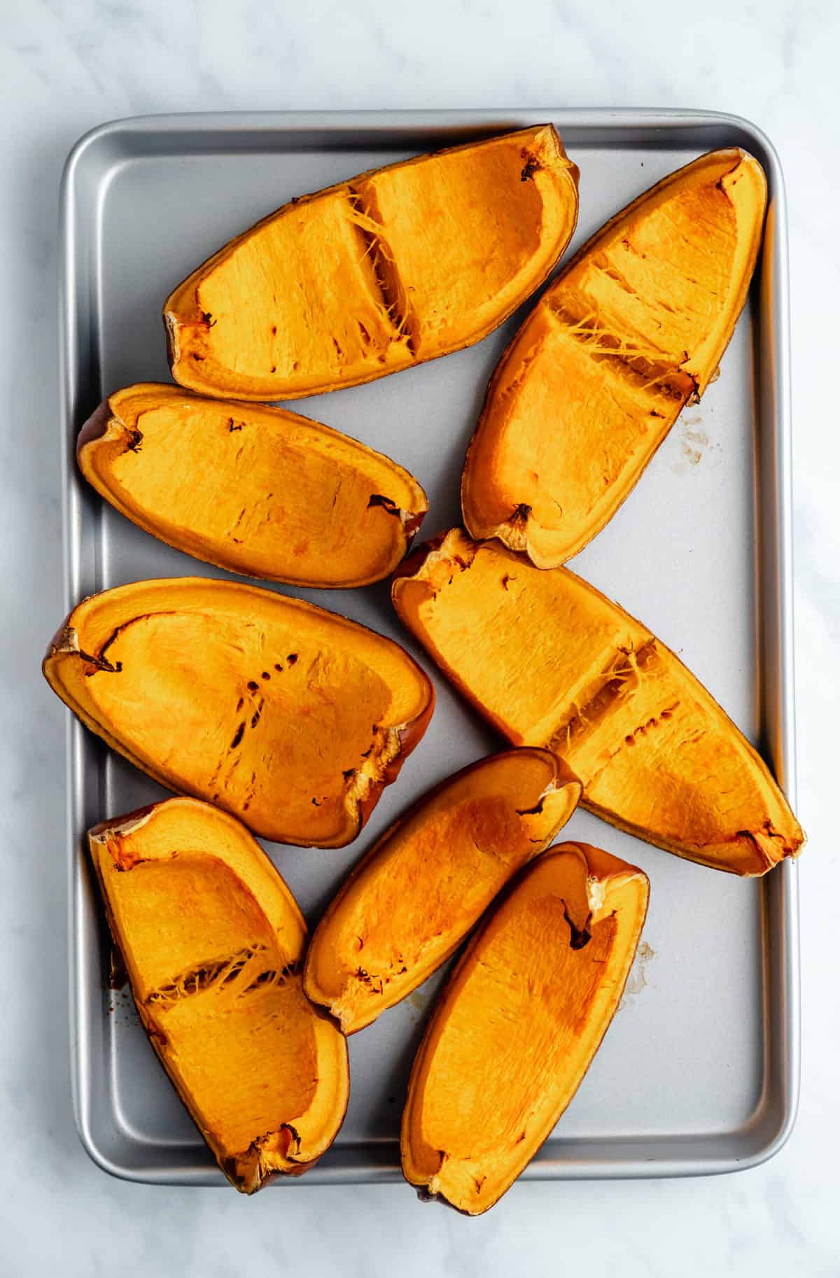 roasted pumpkin on a baking sheet