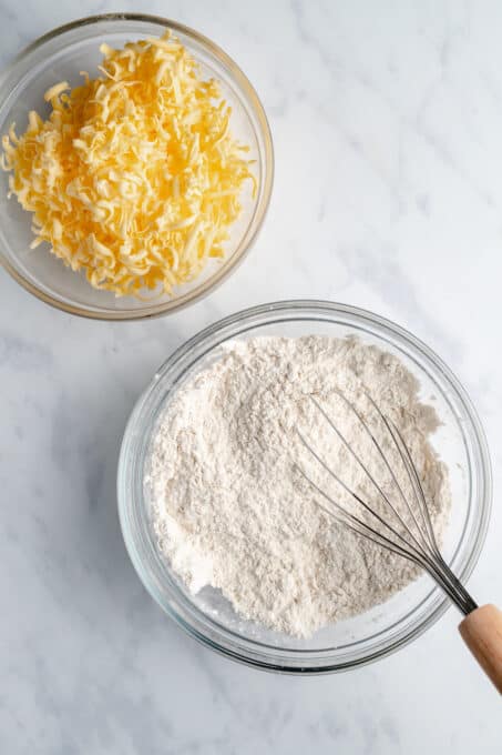 Two Clear Bowls Containing Flour and Vegan Butter