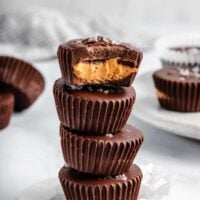 Four Vegan Peanut Butter Cups Piled On Top of One Another