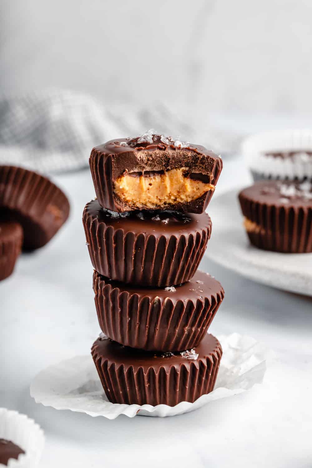 Four Vegan Peanut Butter Cups Piled On Top of One Another