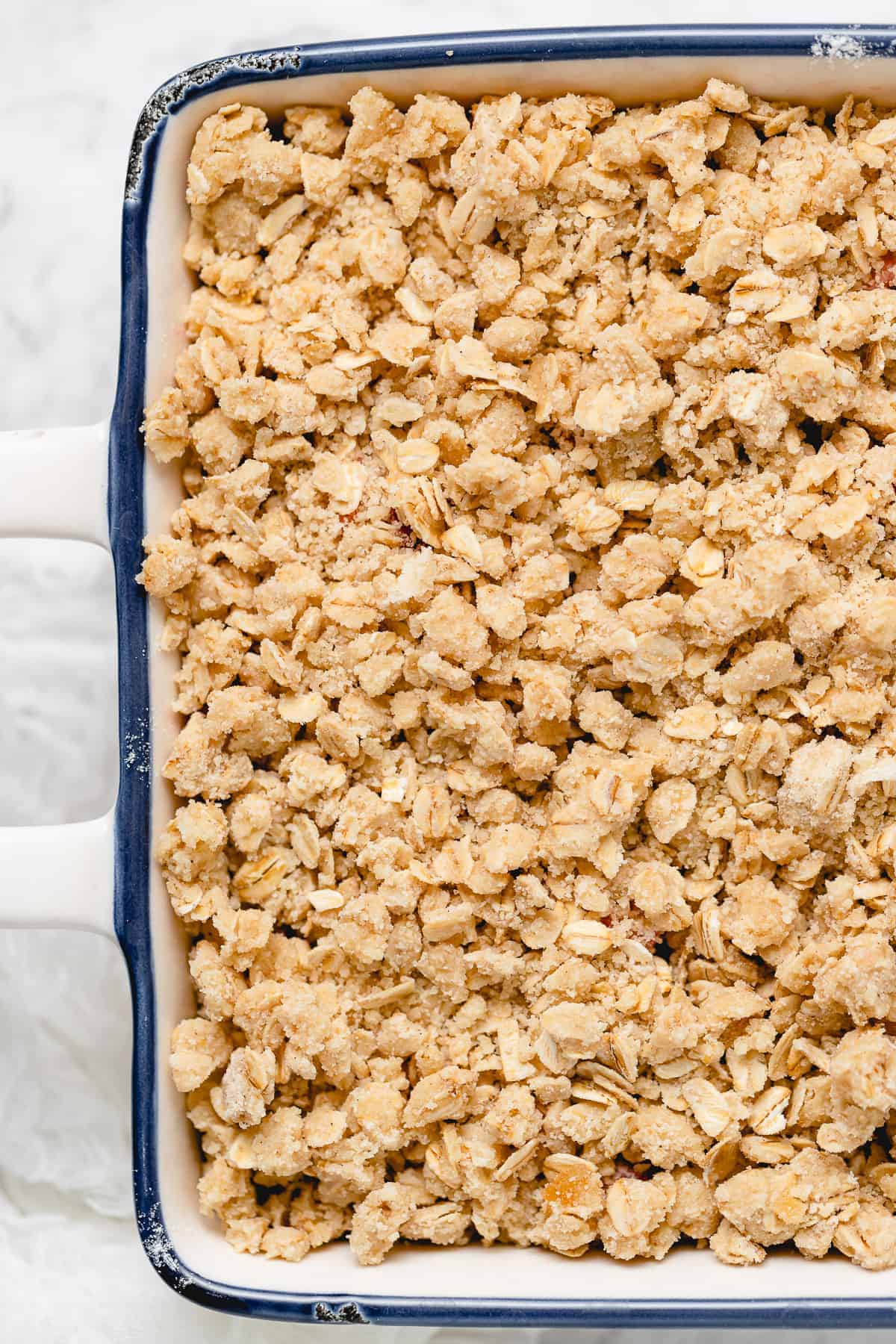 raw crisp on top of uncooked strawberry mix