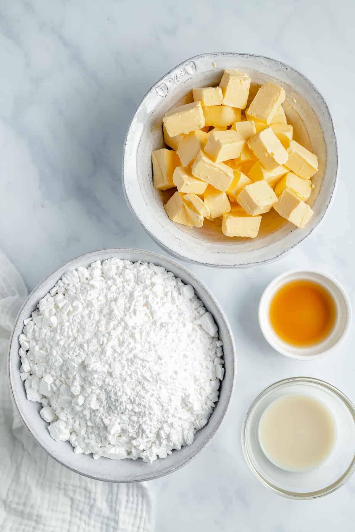 vegan buttercream frosting ingredients in separate bowls