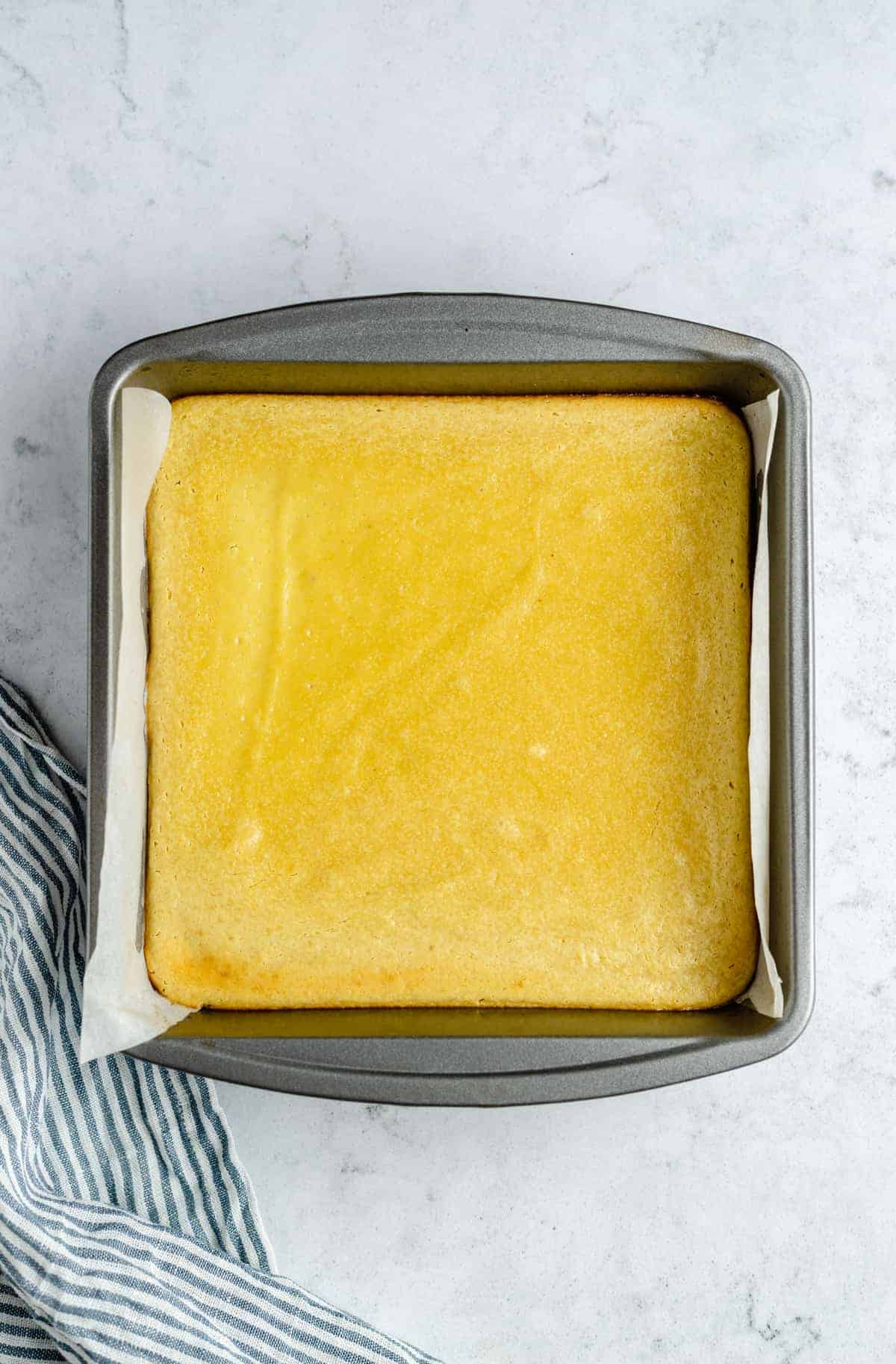 Baked vegan lemon bars in a pan.