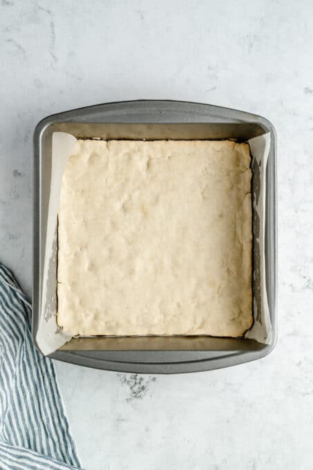 Baked shortbread crust in a pan.