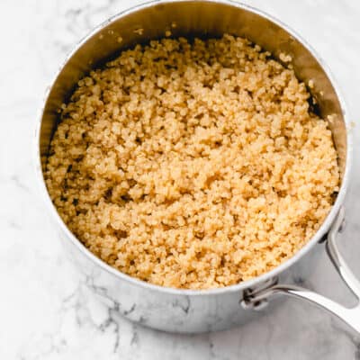 cooked quinoa in a silver saucepan