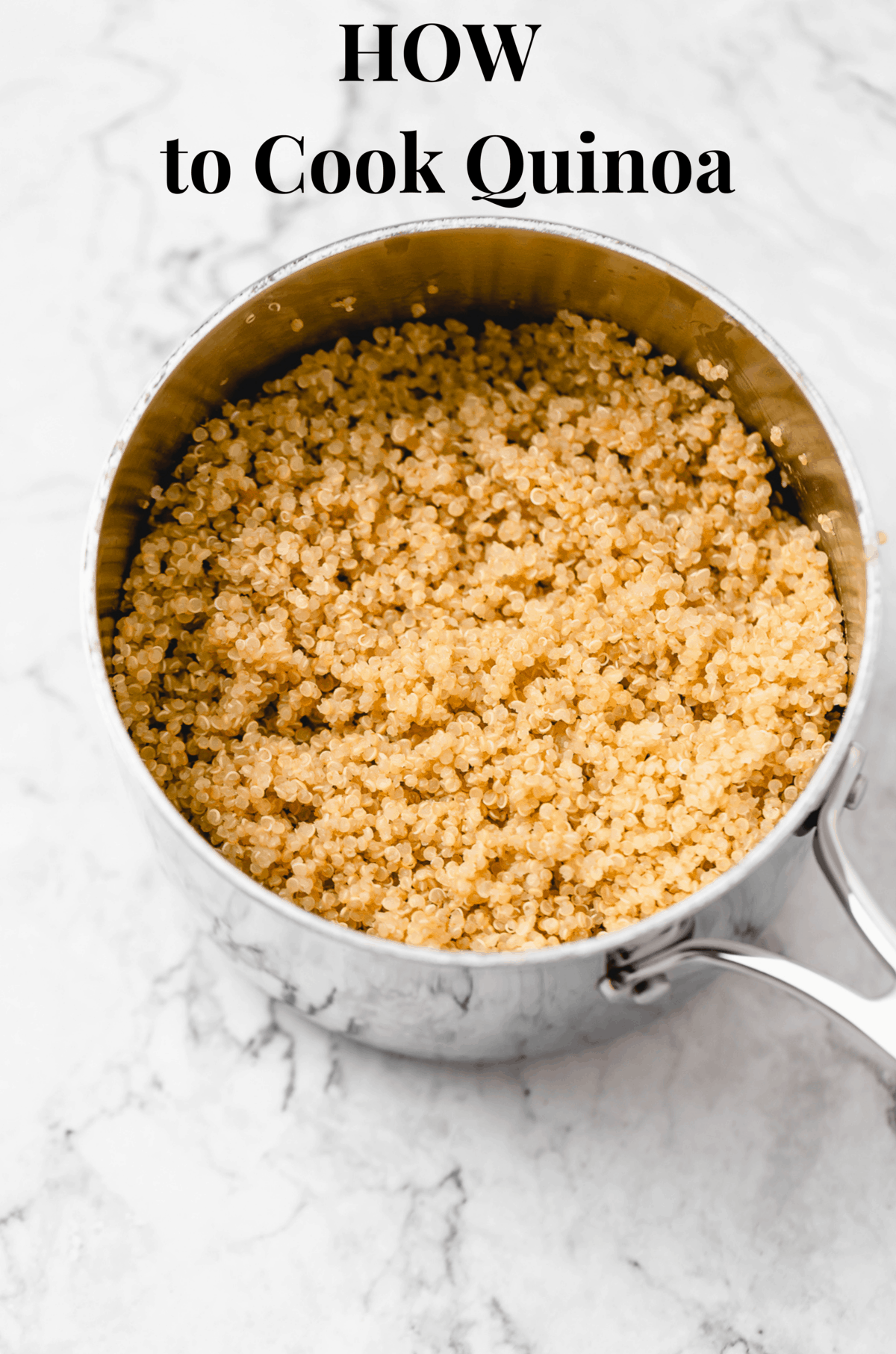 cooked quinoa in a silver saucepan