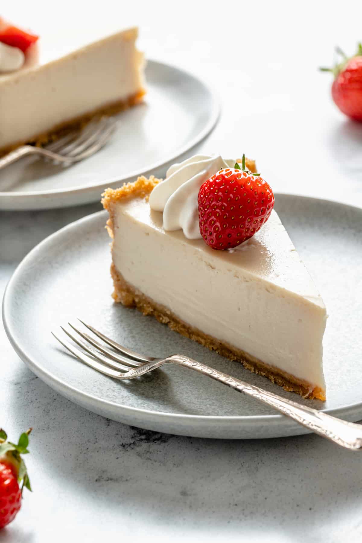 Slice of vegan cheesecake on a plate.