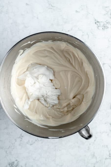 Cream cheese and coconut cream in a bowl.