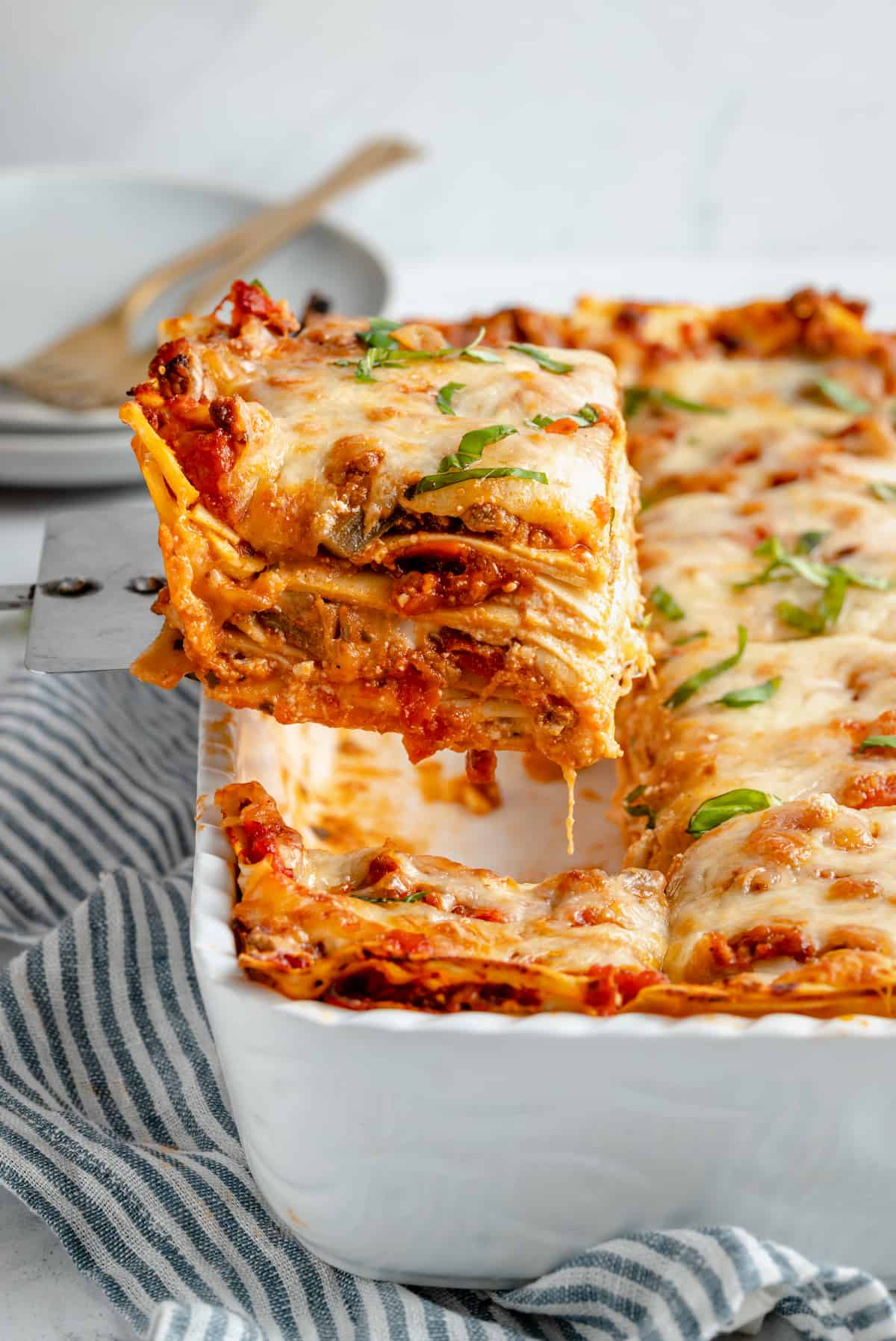 A serving of cheesy vegan lasagna.