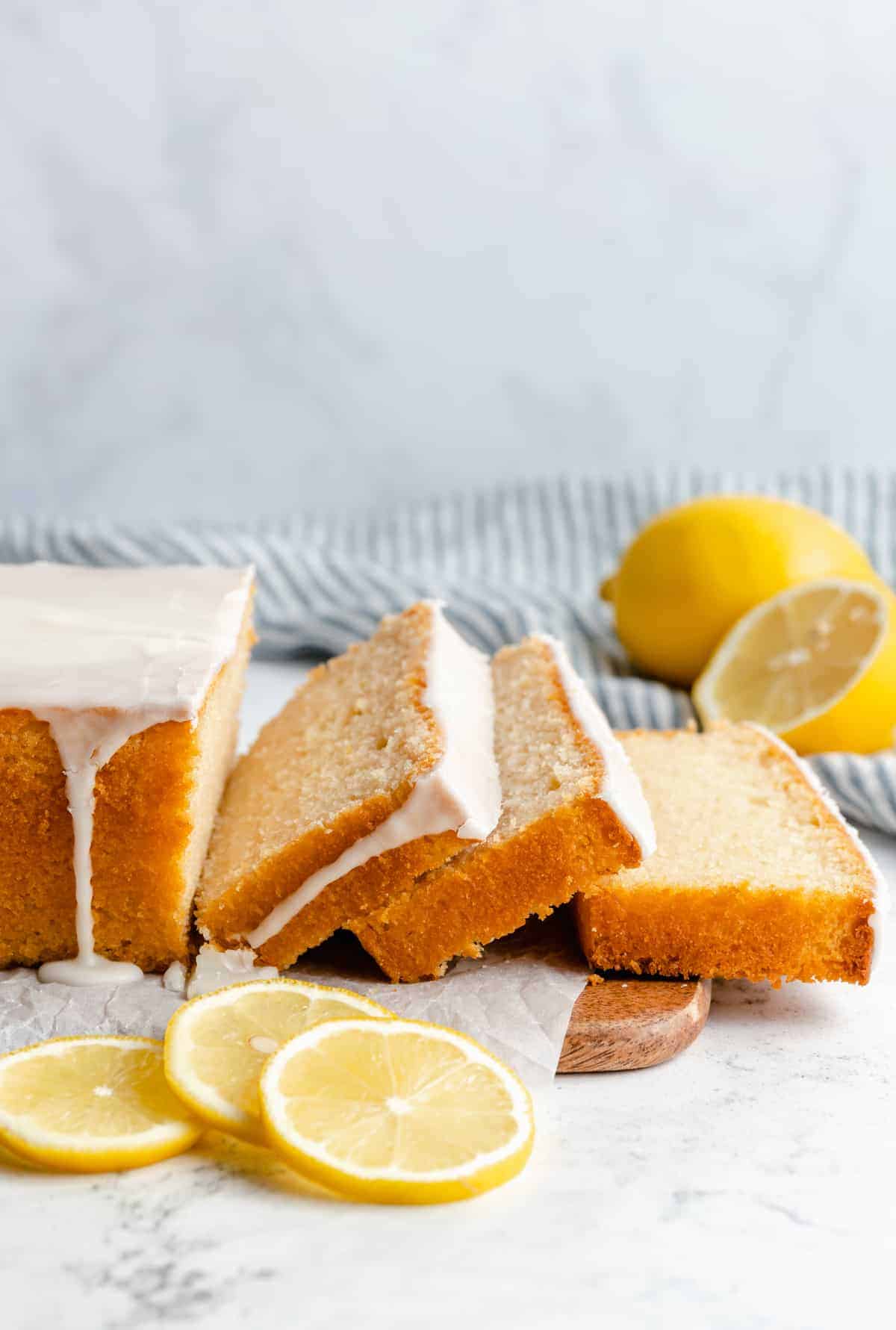Sliced loaf of vegan lemon quick bread.