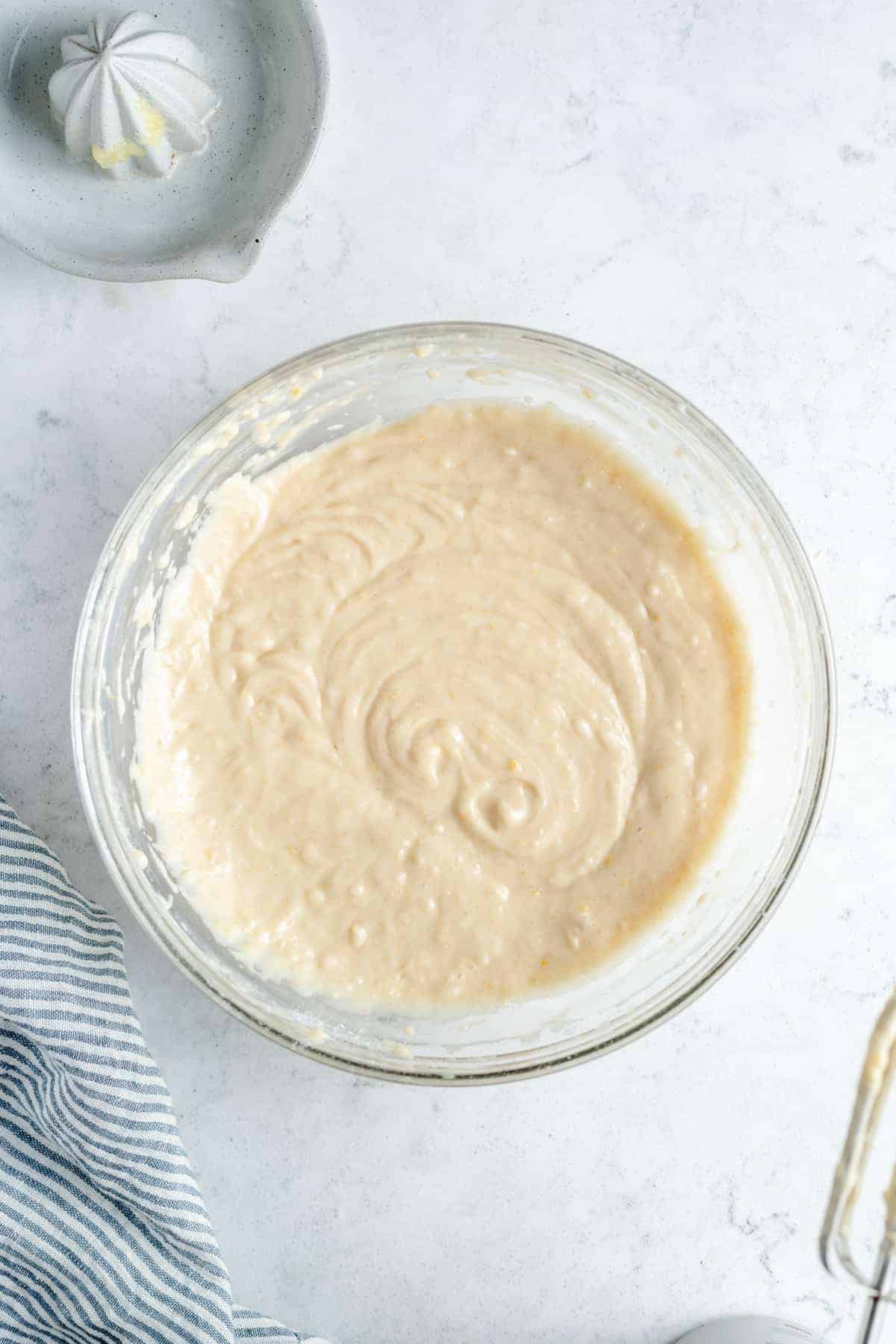 Lemon loaf batter in a mixing bowl. - 5