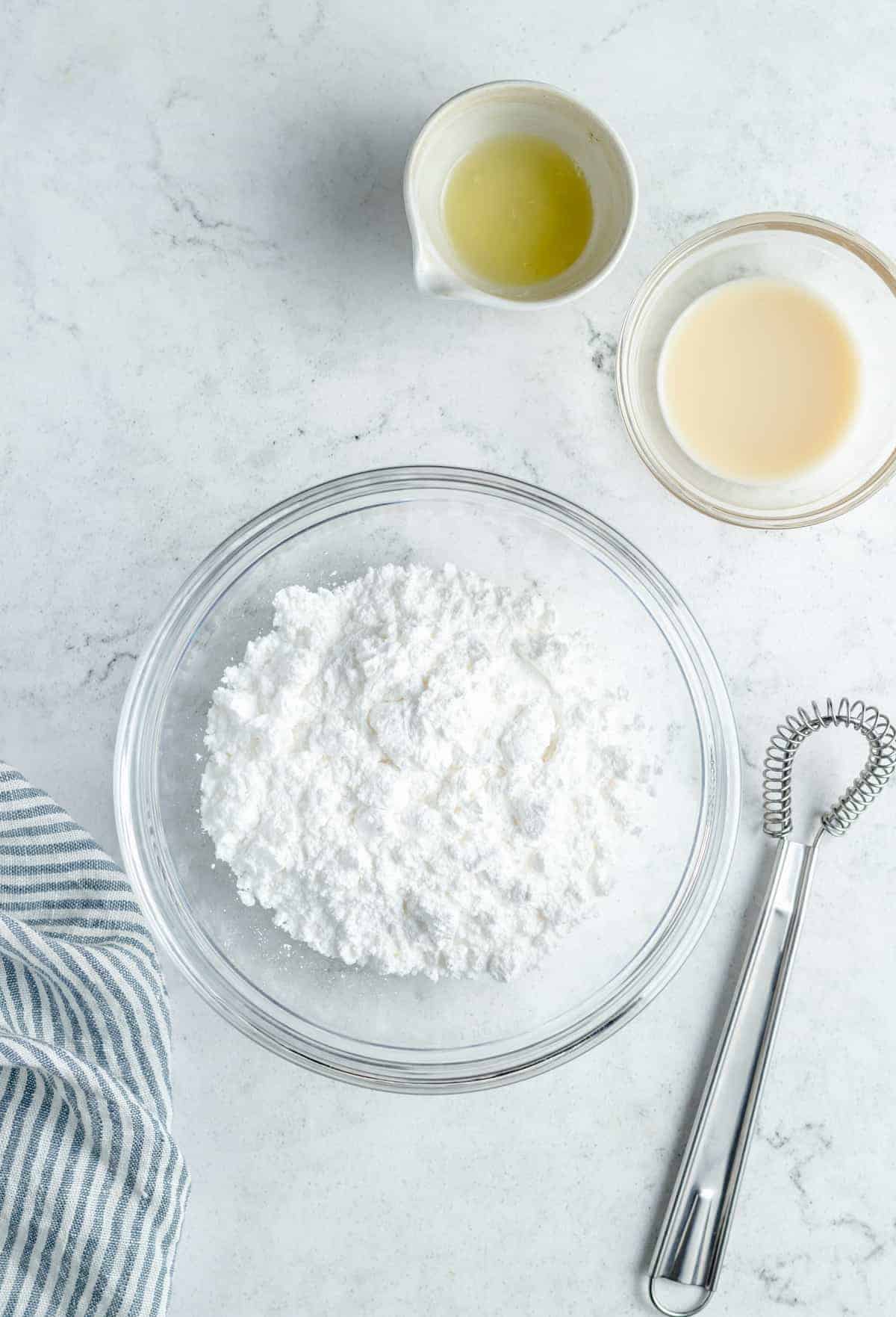 Powdered sugar in a mixing bowl. - 6