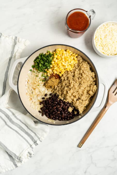 Corn, black beans, and quinoa in a pan.