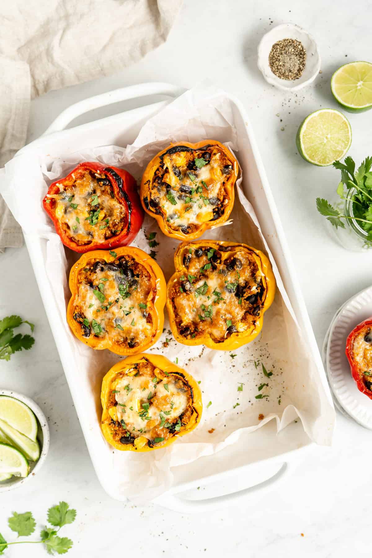 5 peppers stuffed with cheese, corn, black beans, and quinoa.