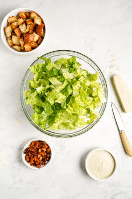 A bowl of chopped romaine lettuce.