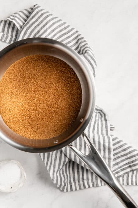 Brown sugar in a saucepan.