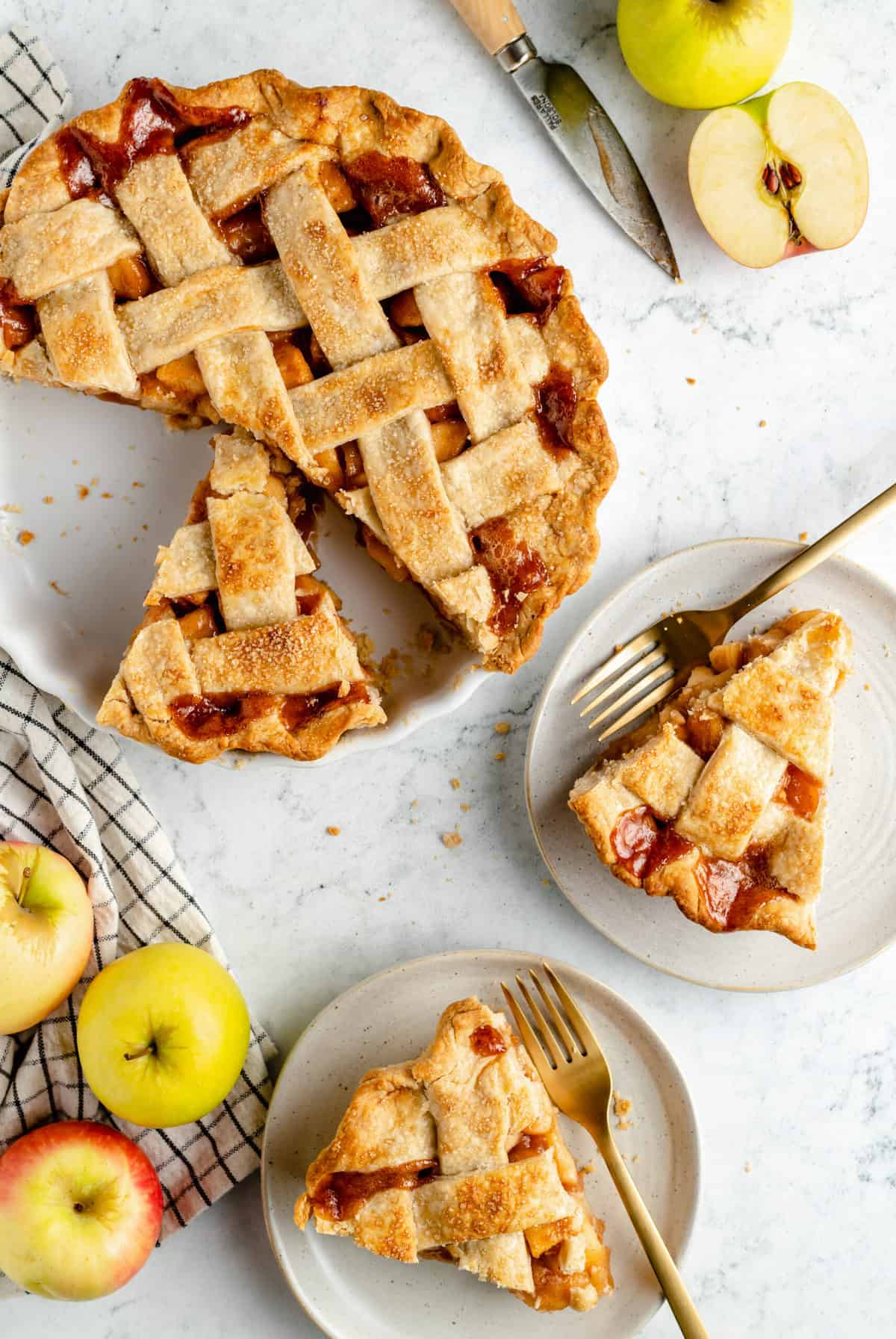 Slices of vegan apple pie on a platter.
