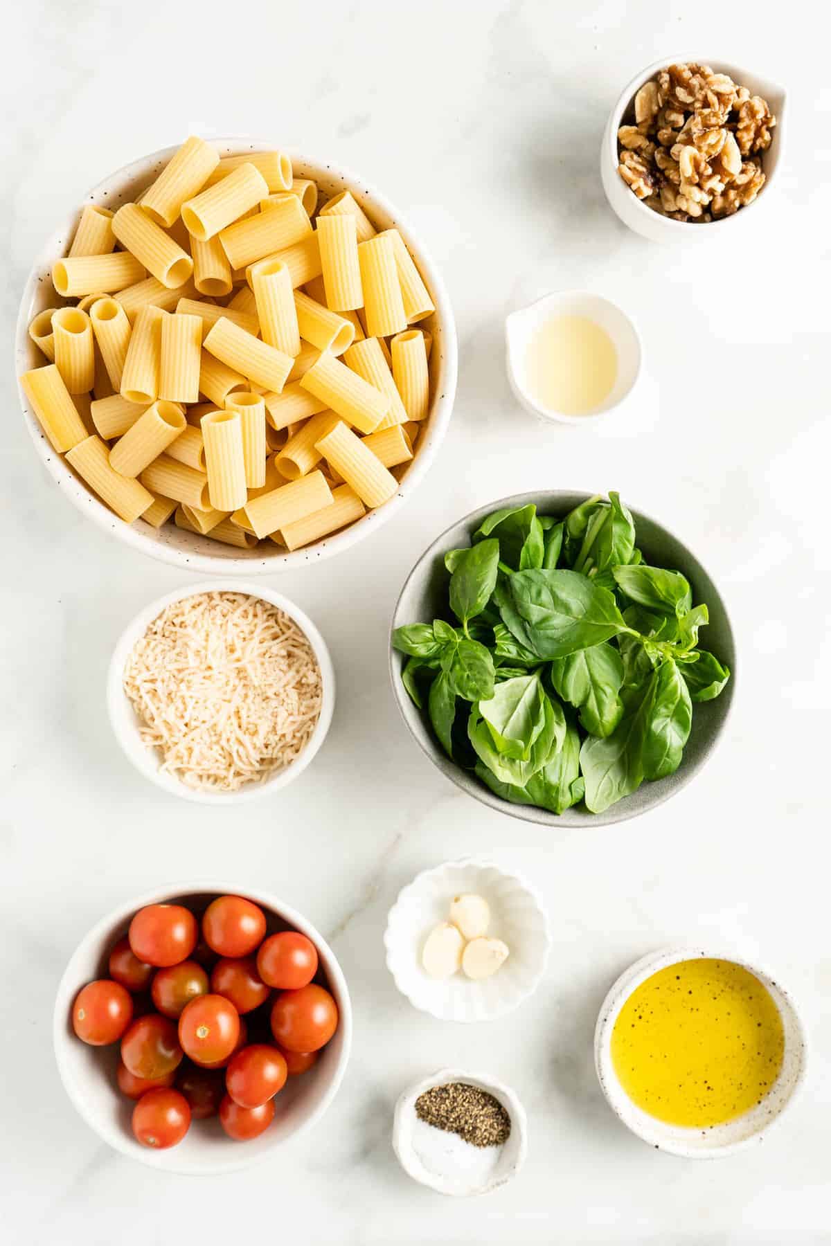 Overhead view of ingredients for pesto pasta