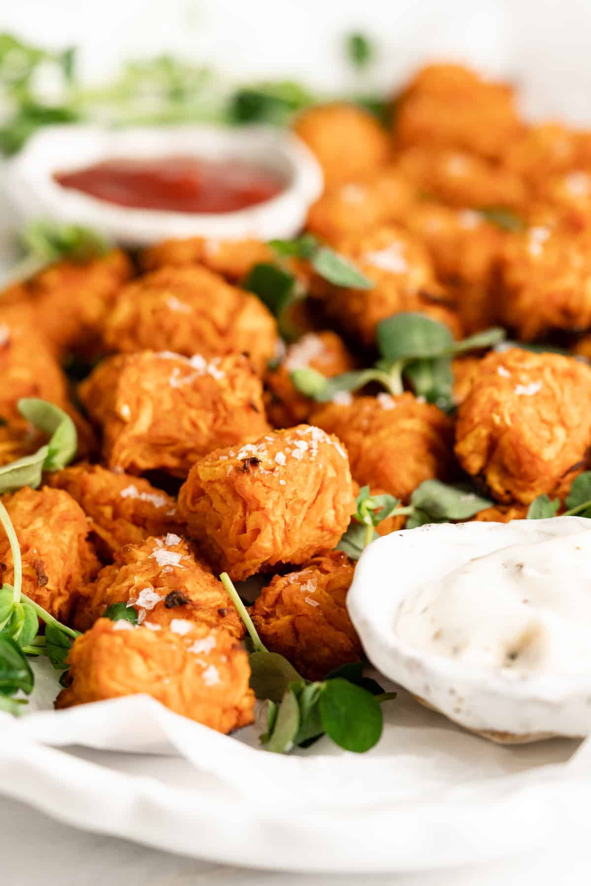 Closeup view of sweet potato tots on platter