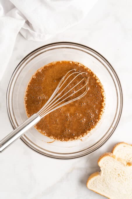 Whisking vegan pumpkin custard for French toast