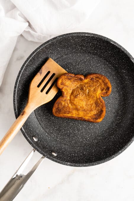 Pumpkin French toast being cooked in skillet