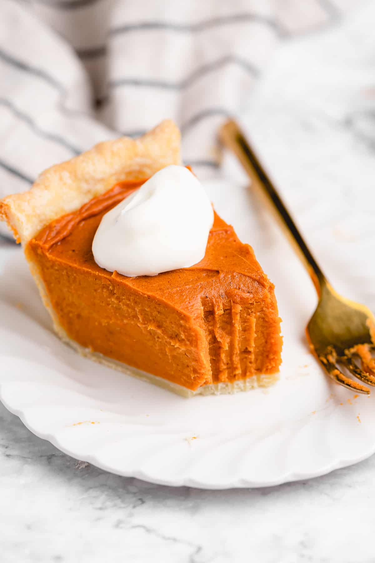 sweet potato pie with a bite taken out of it