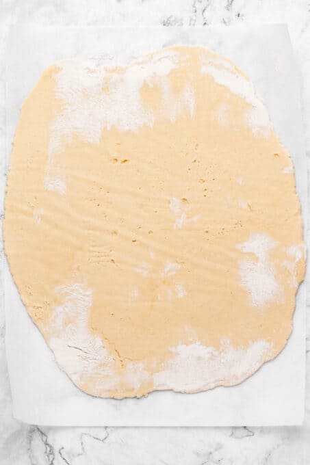 Overhead view of rolled out sugar cookie dough