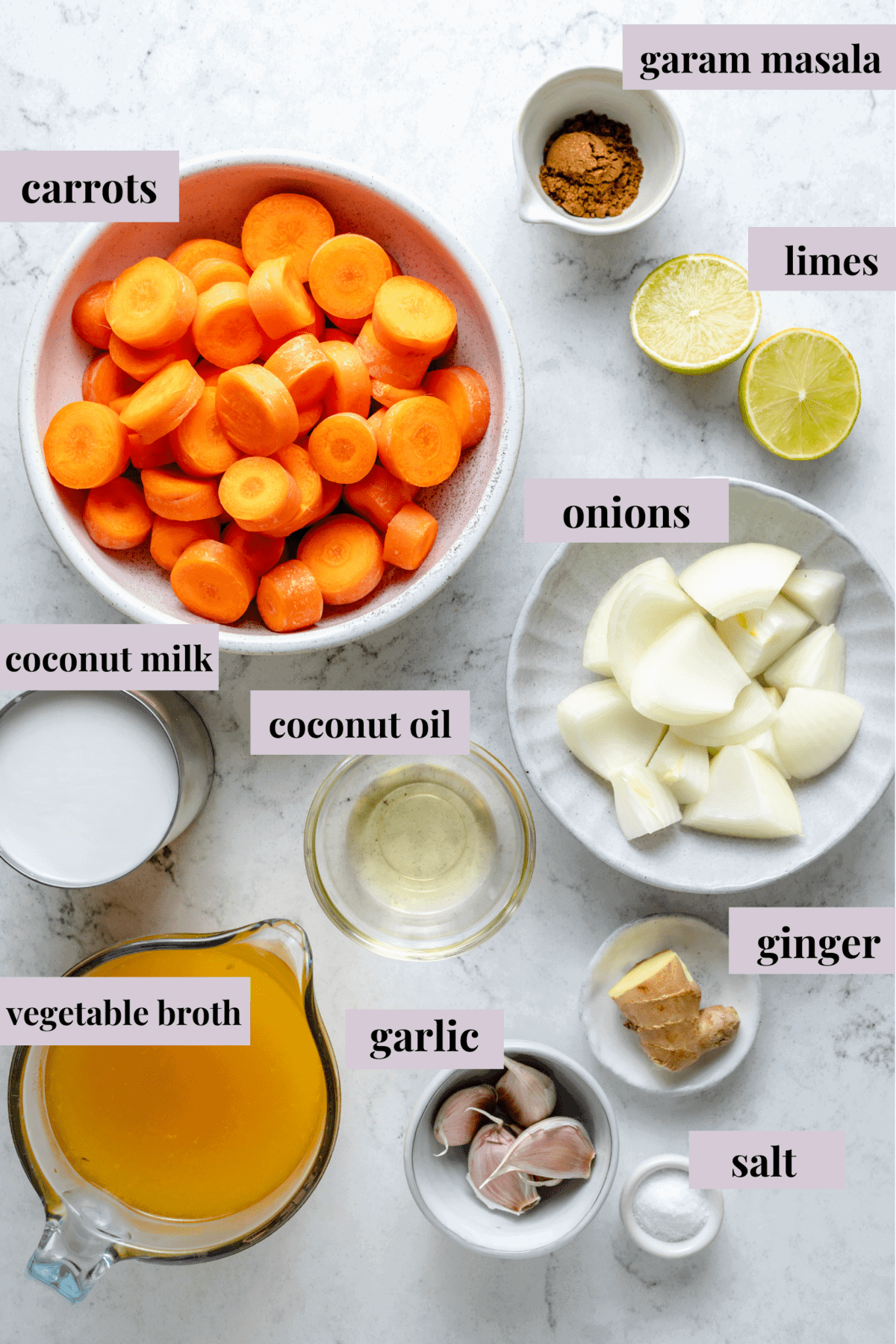 Overhead view of roasted carrot soup ingredients