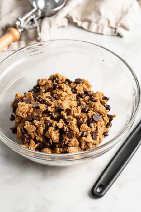 Edible chocolate chip cookie dough in glass bowl