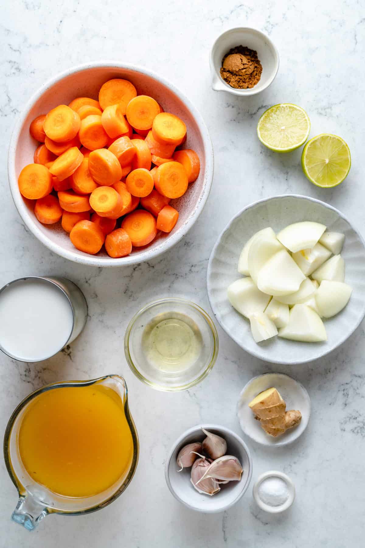 Overhead view of roasted carrot soup ingredients
