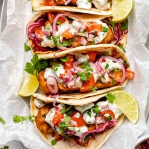 Overhead view of vegan fish tacos on platter