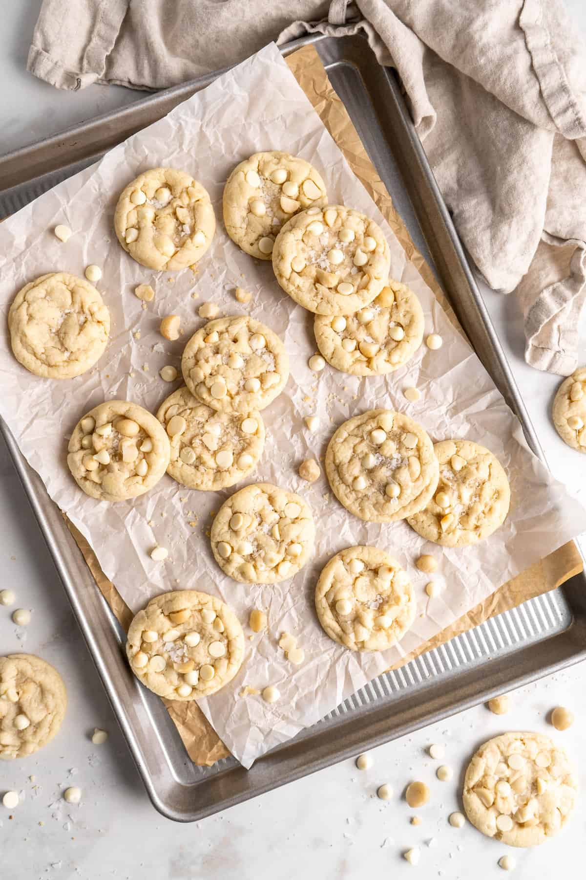 White Chocolate Macadamia Nut Cookies on parchment-lined baking sheet