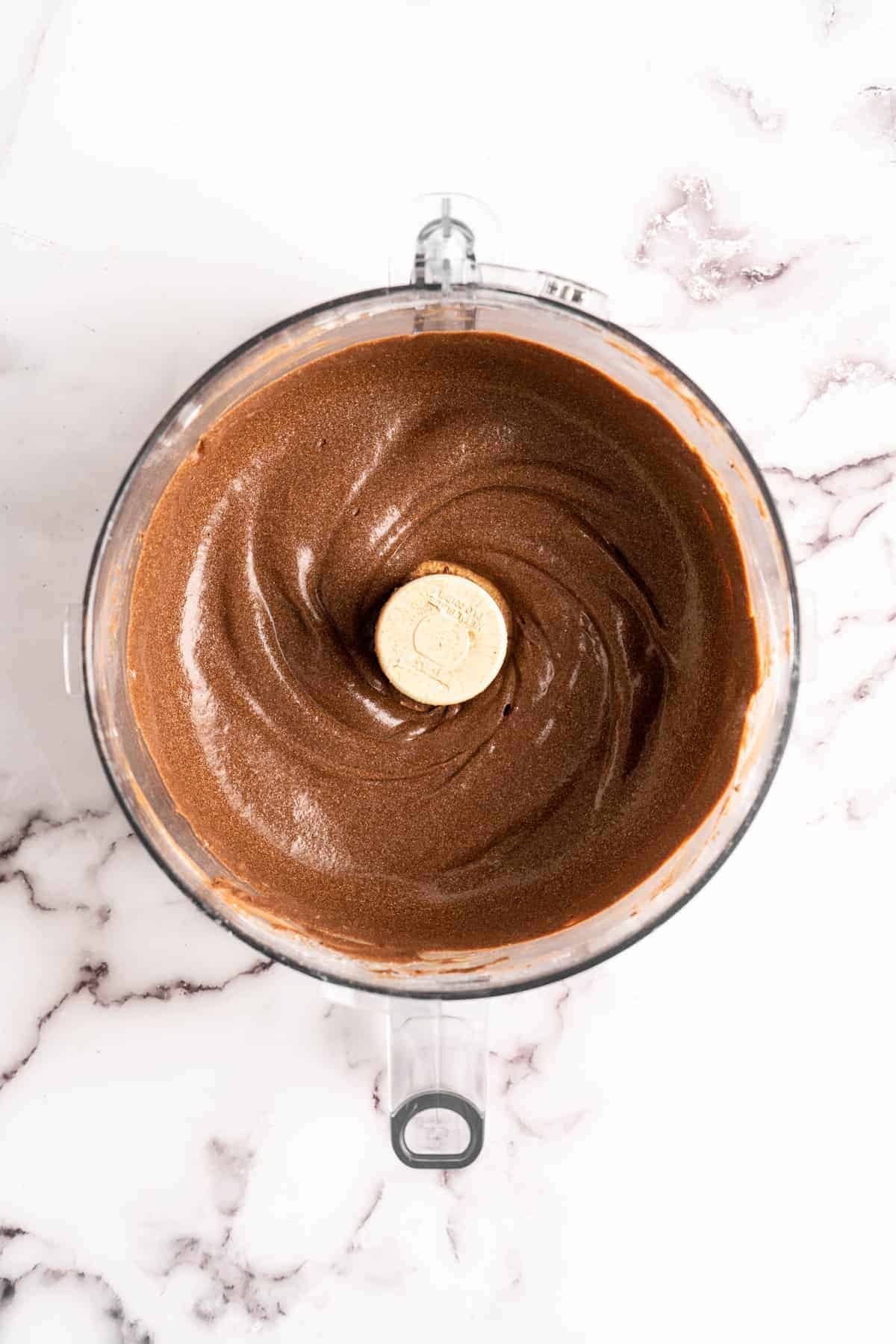 Chocolate avocado ice cream base in food processor bowl