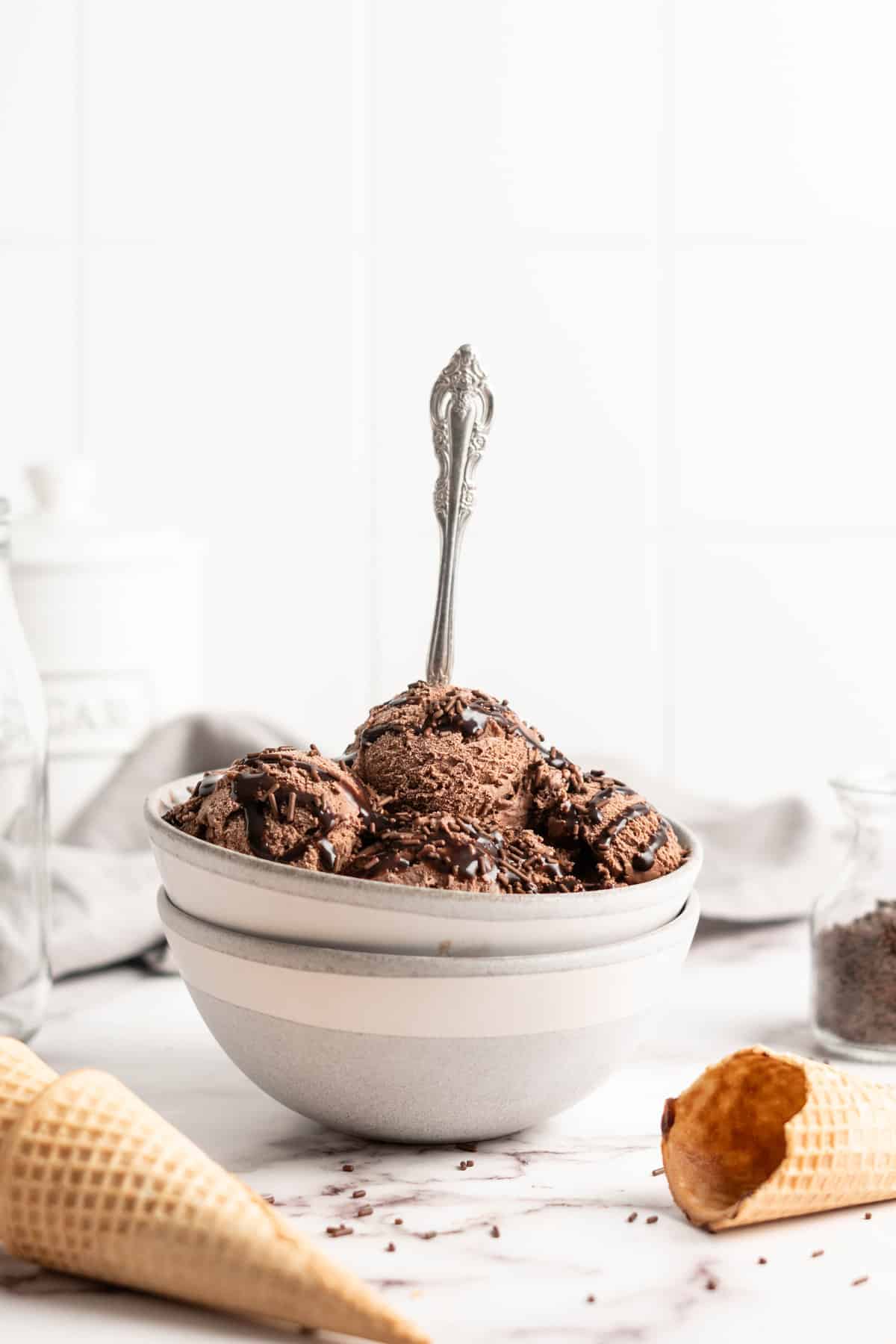 Bowl of chocolate avocado ice cream with spoon