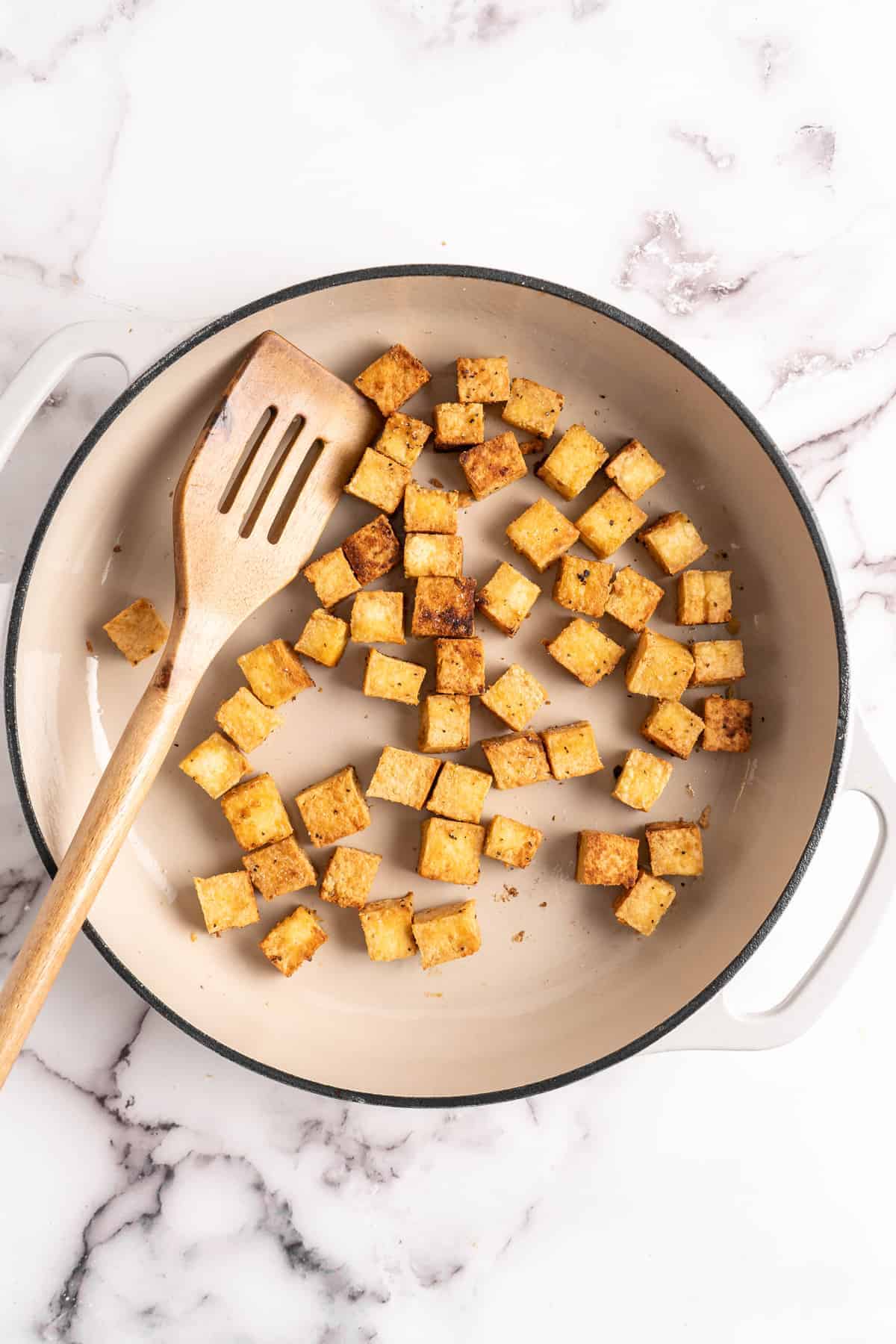 Cooked crispy tofu in pan