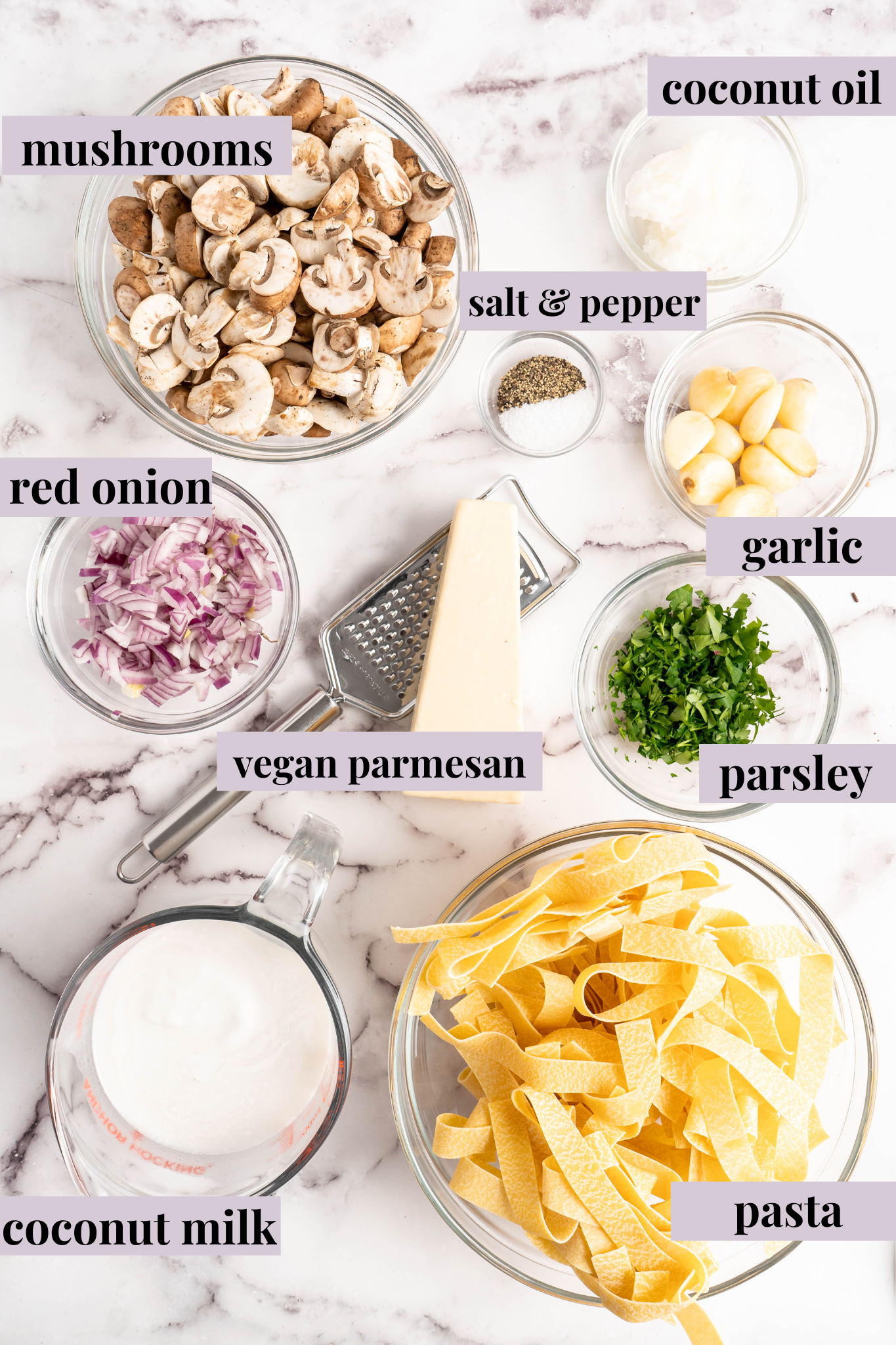 Overhead view of Garlic Mushroom Pasta ingredients with labels