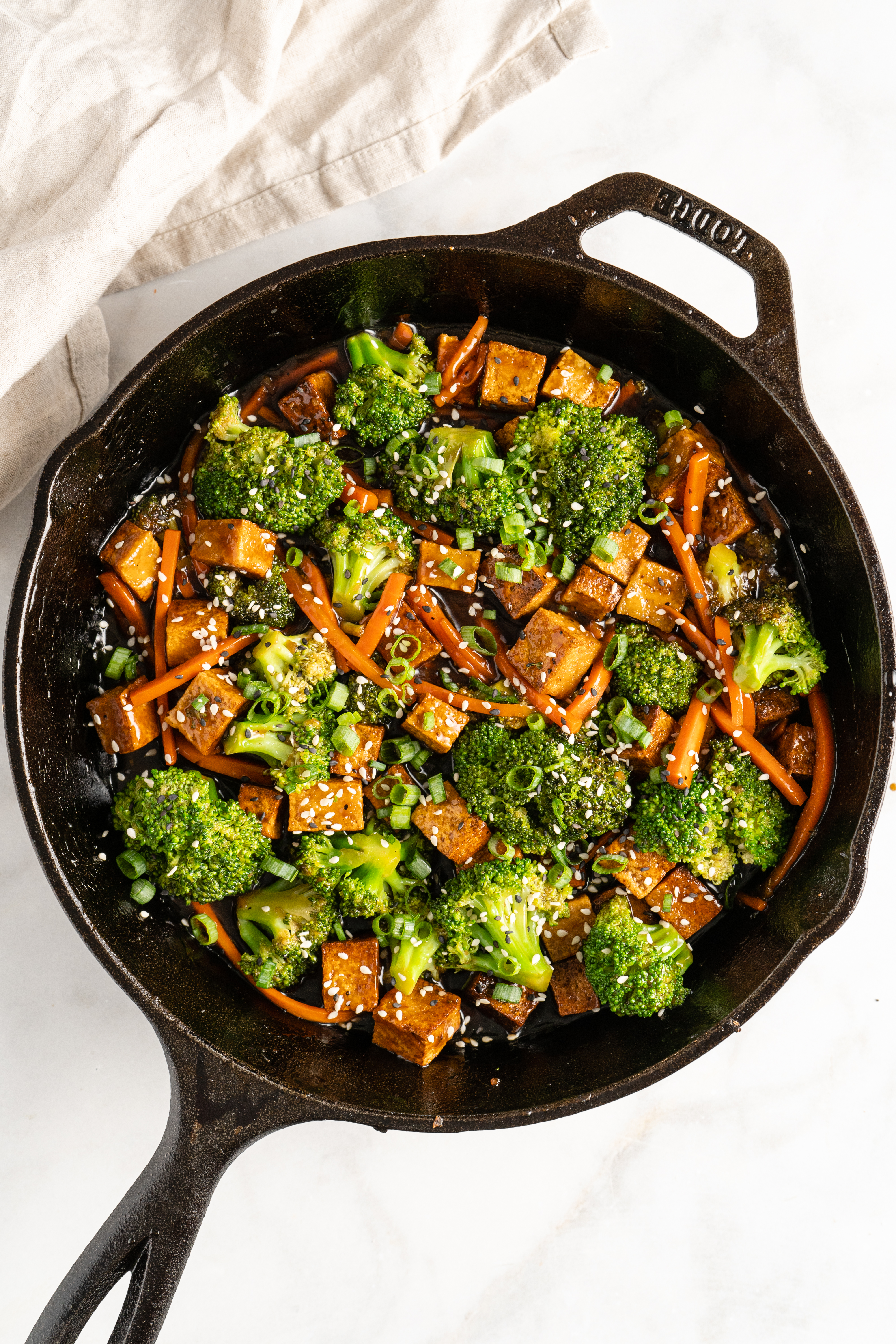 Tofu and veggie stir fry in cast iron skillet