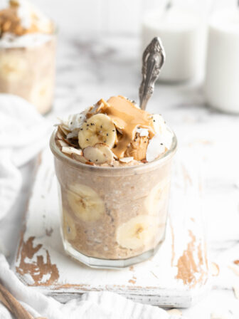 Peanut butter banana overnight oats in jar with spoon
