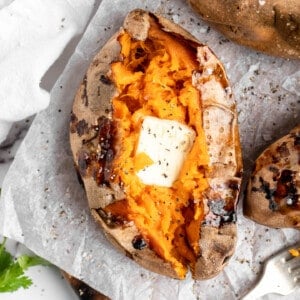 Air fryer sweet potato topped with butter