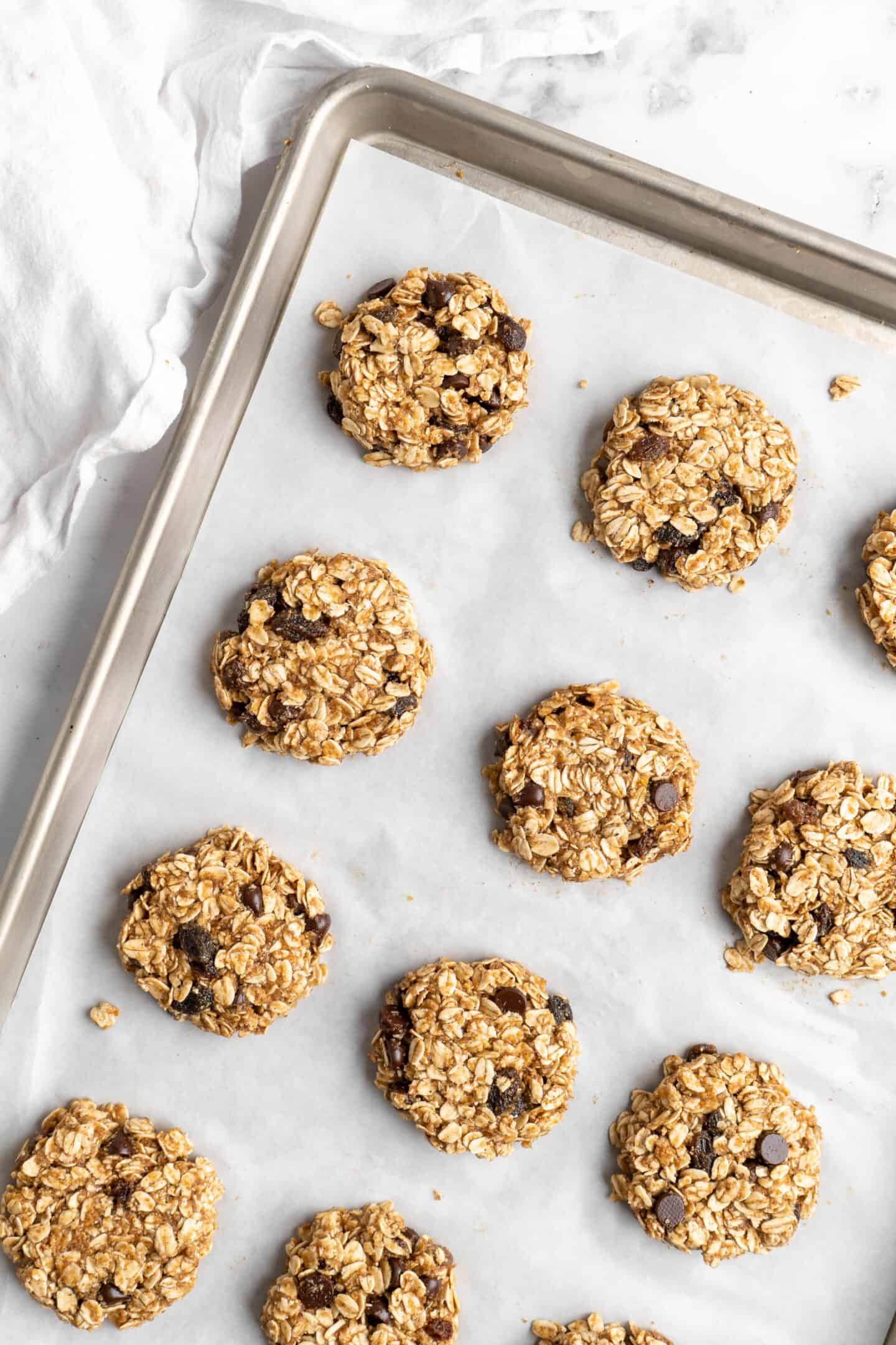 Overhead view of banana oatmeal cookies on baking sheet before baking