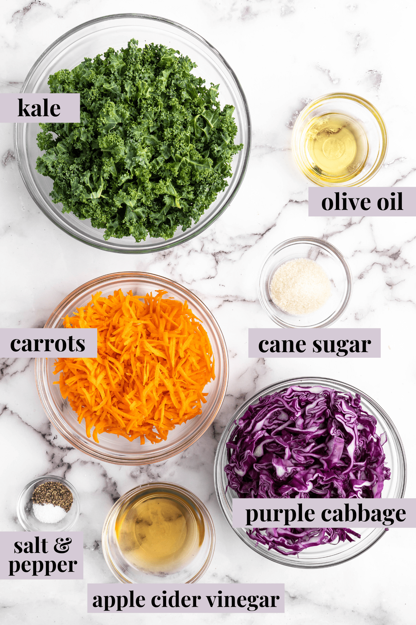 Ingredients for kale slaw with text labels overlaying each ingredient.