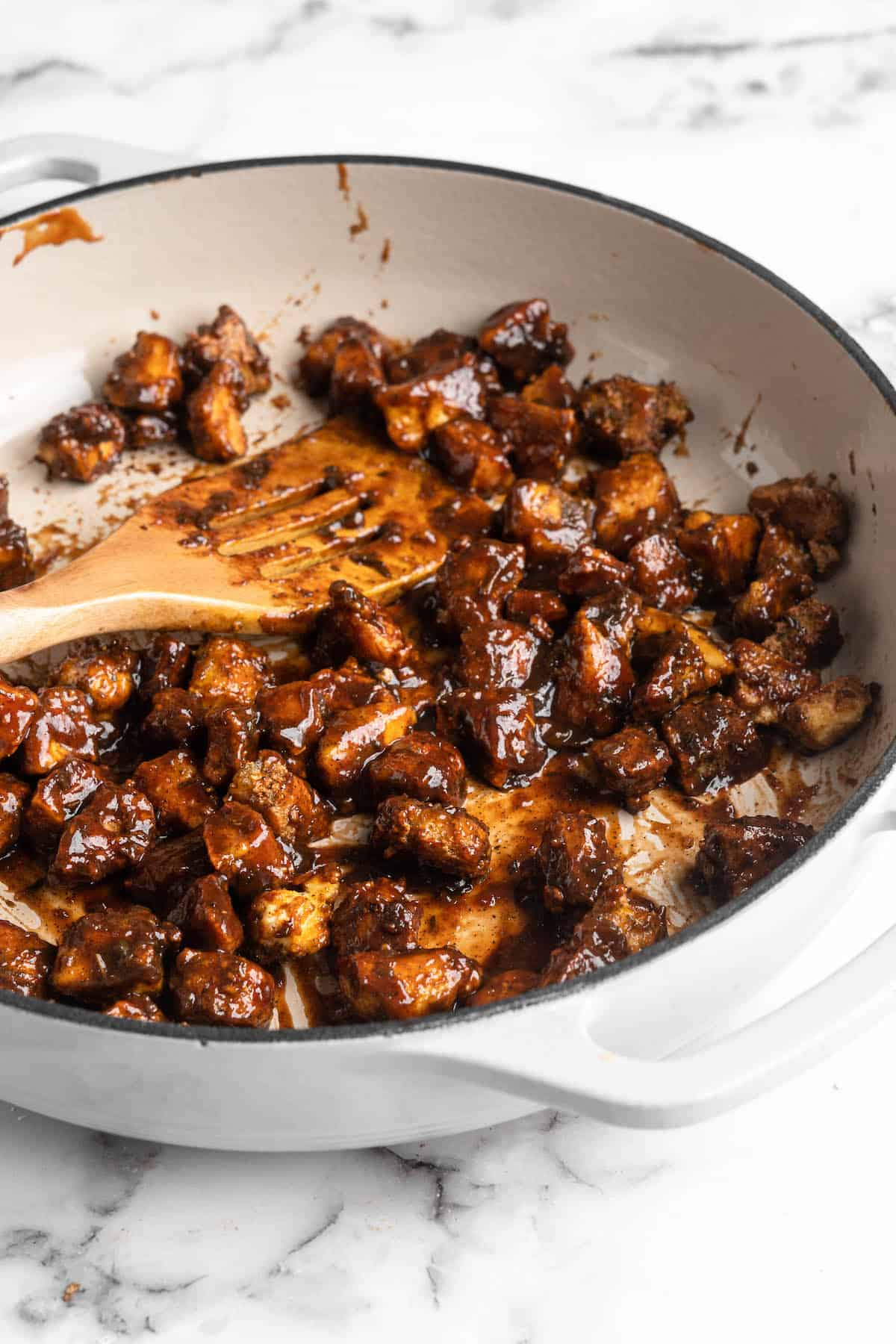 Saucy Jamaican jerk tofu in skillet