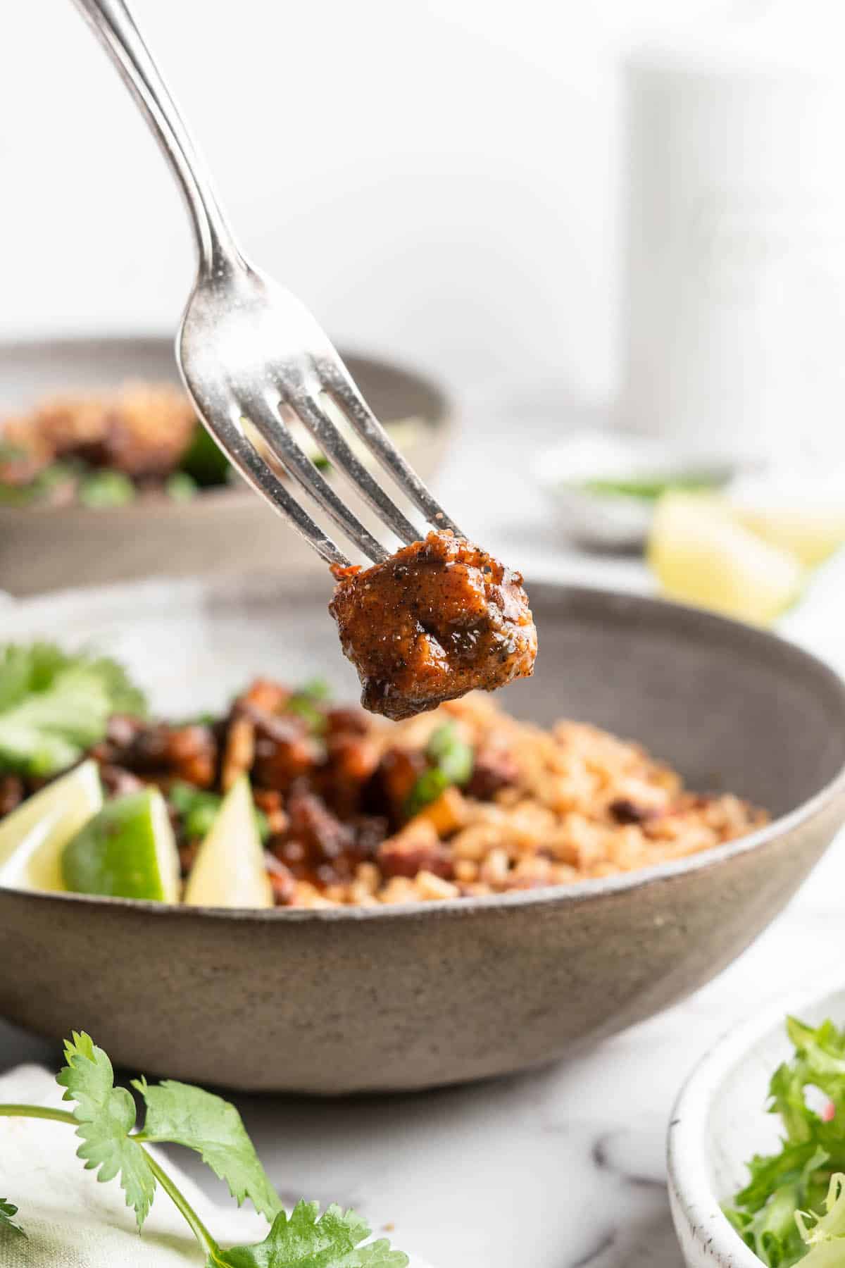 Piece of Jamaican jerk tofu on fork