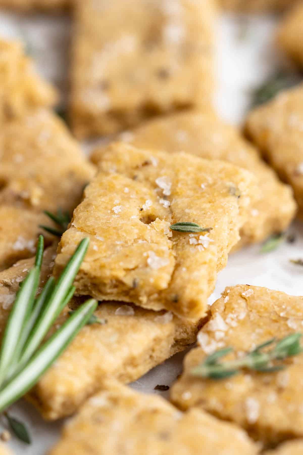 Closeup of vegan cheez-its with sea salt and rosemary