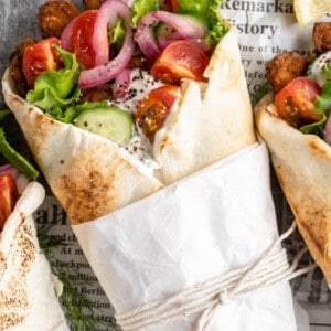 Vegan gyros wrapped in parchment and string