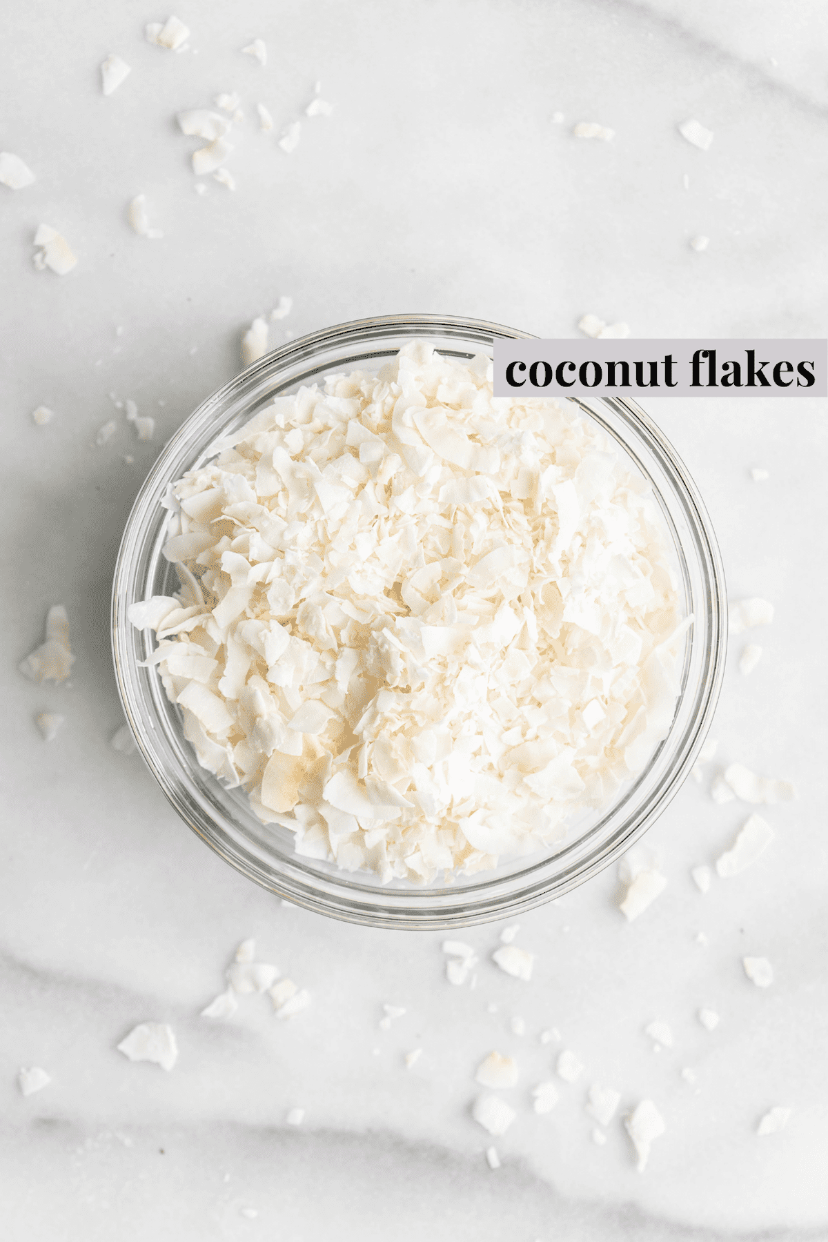 Overhead view of coconut flakes in jar