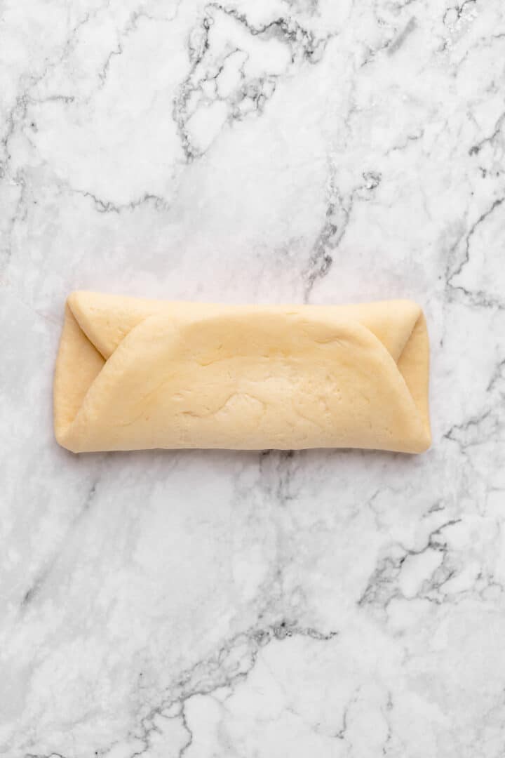 Forming log of milk bread dough