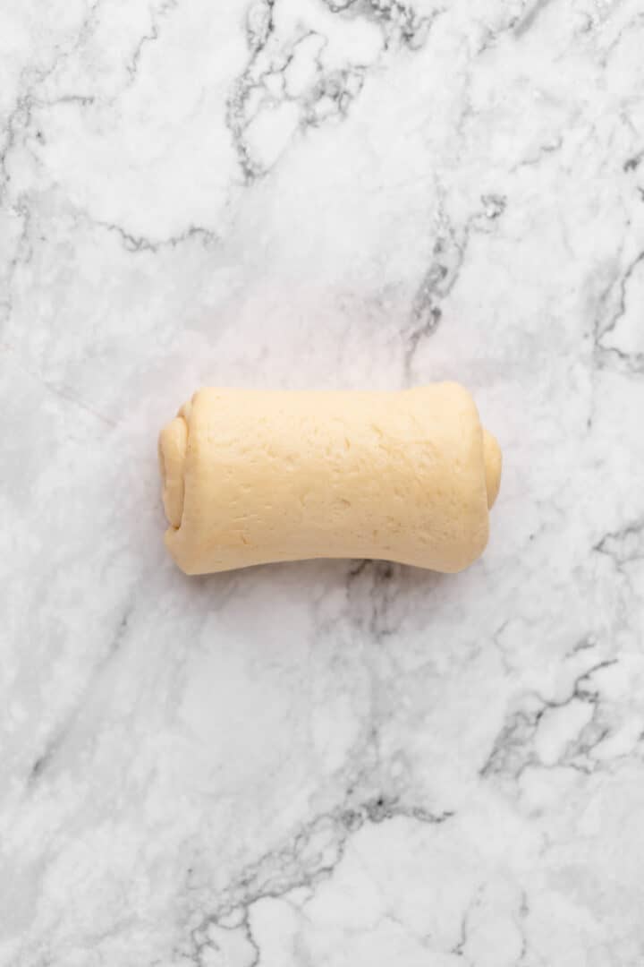 Roll of milk bread dough