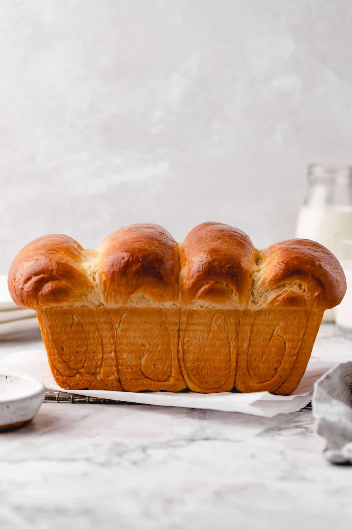 Side view of vegan milk bread, showing swirls of dough
